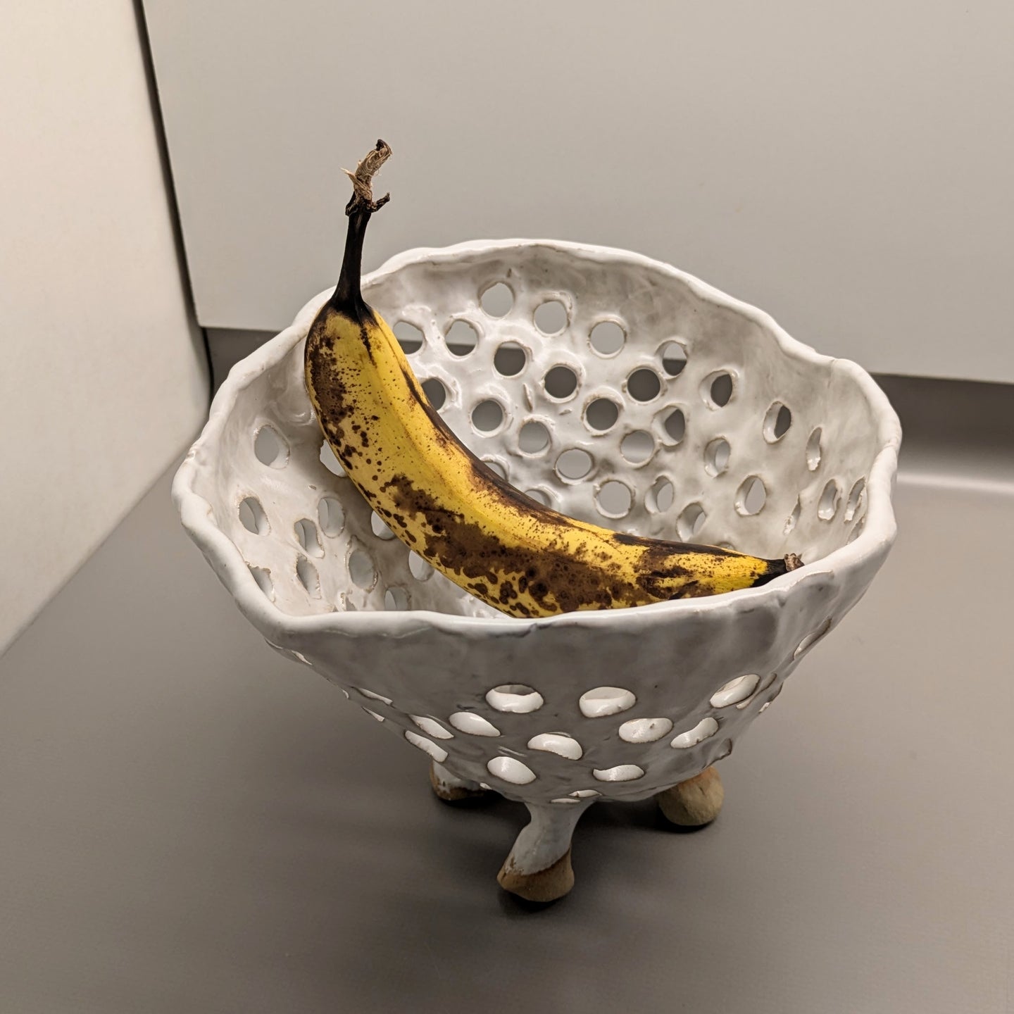 A. Mills Clay Colanders