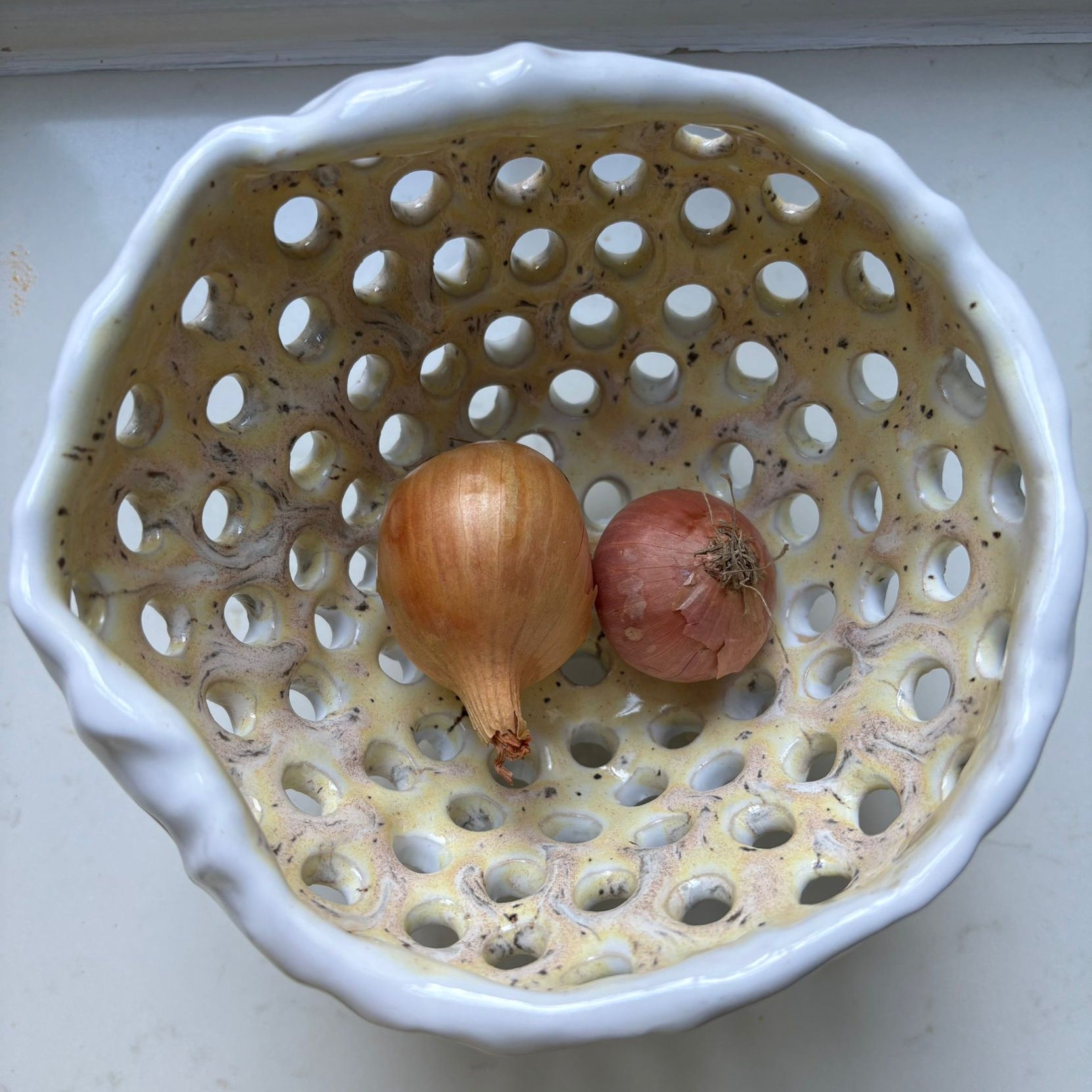 A. Mills Clay Colanders