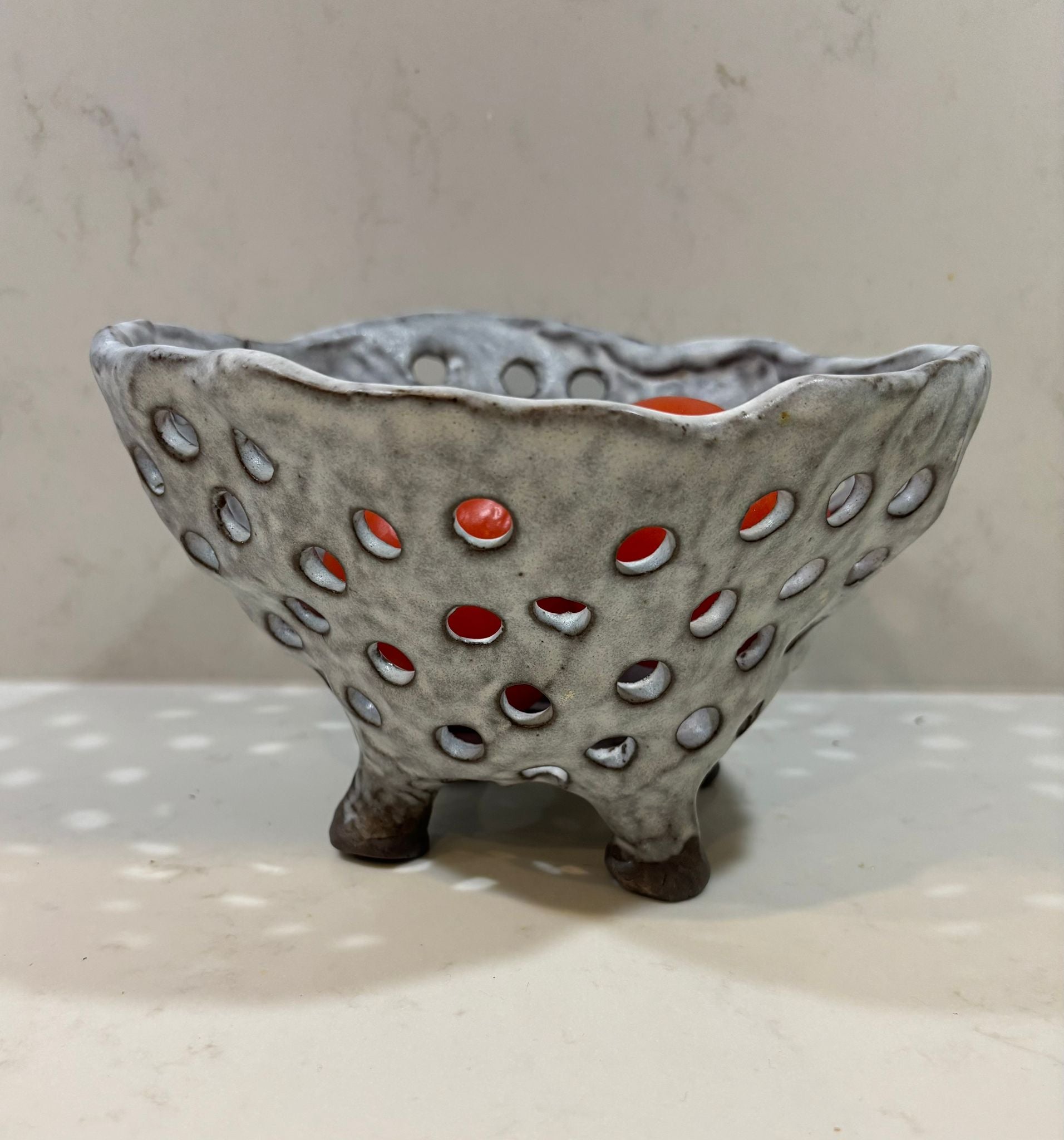 A. Mills Clay Colanders