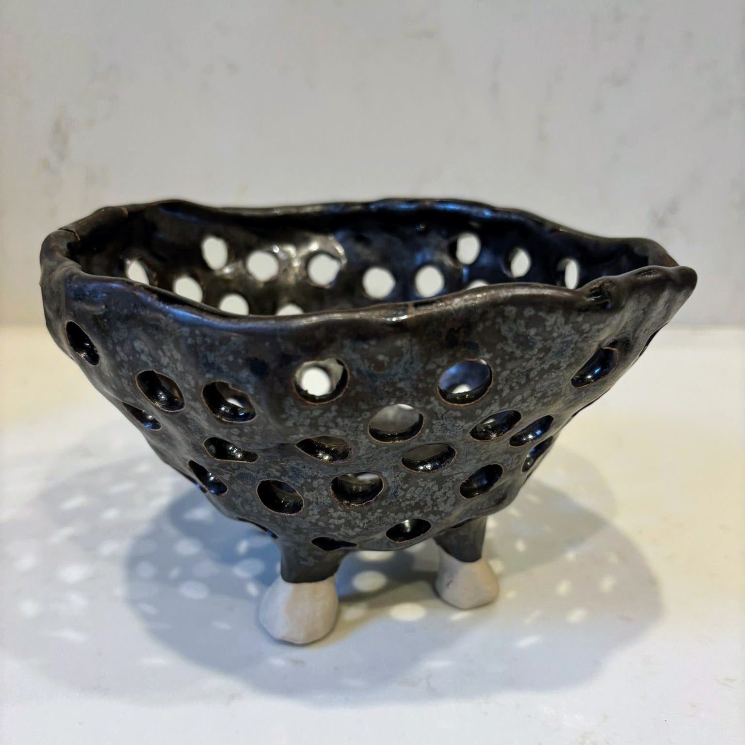 A. Mills Clay Colanders