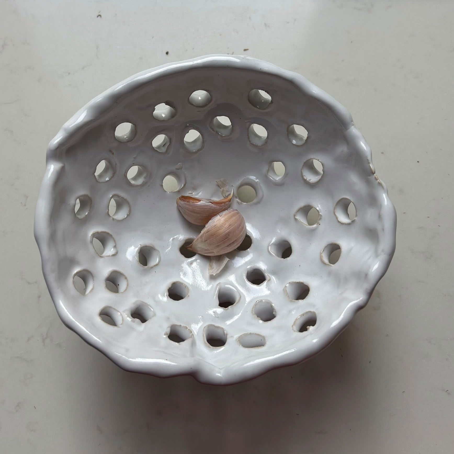A. Mills Clay Colanders