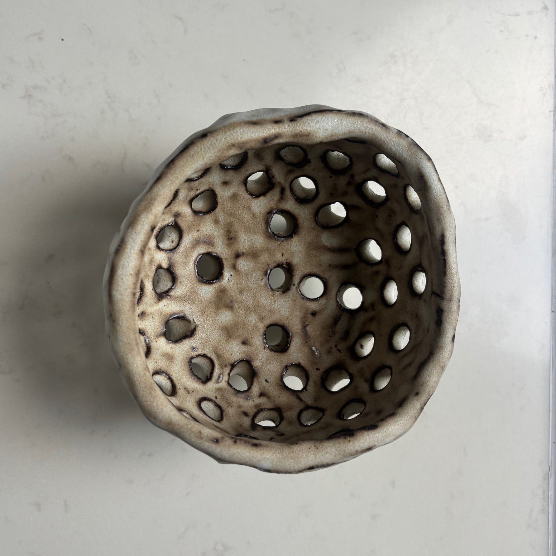 A. Mills Clay Colanders