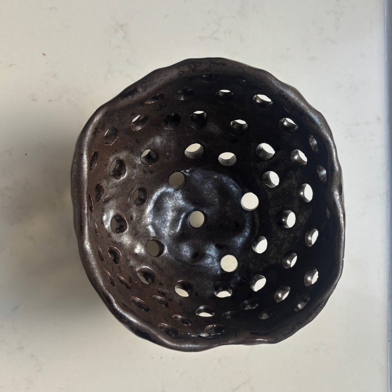 A. Mills Clay Colanders