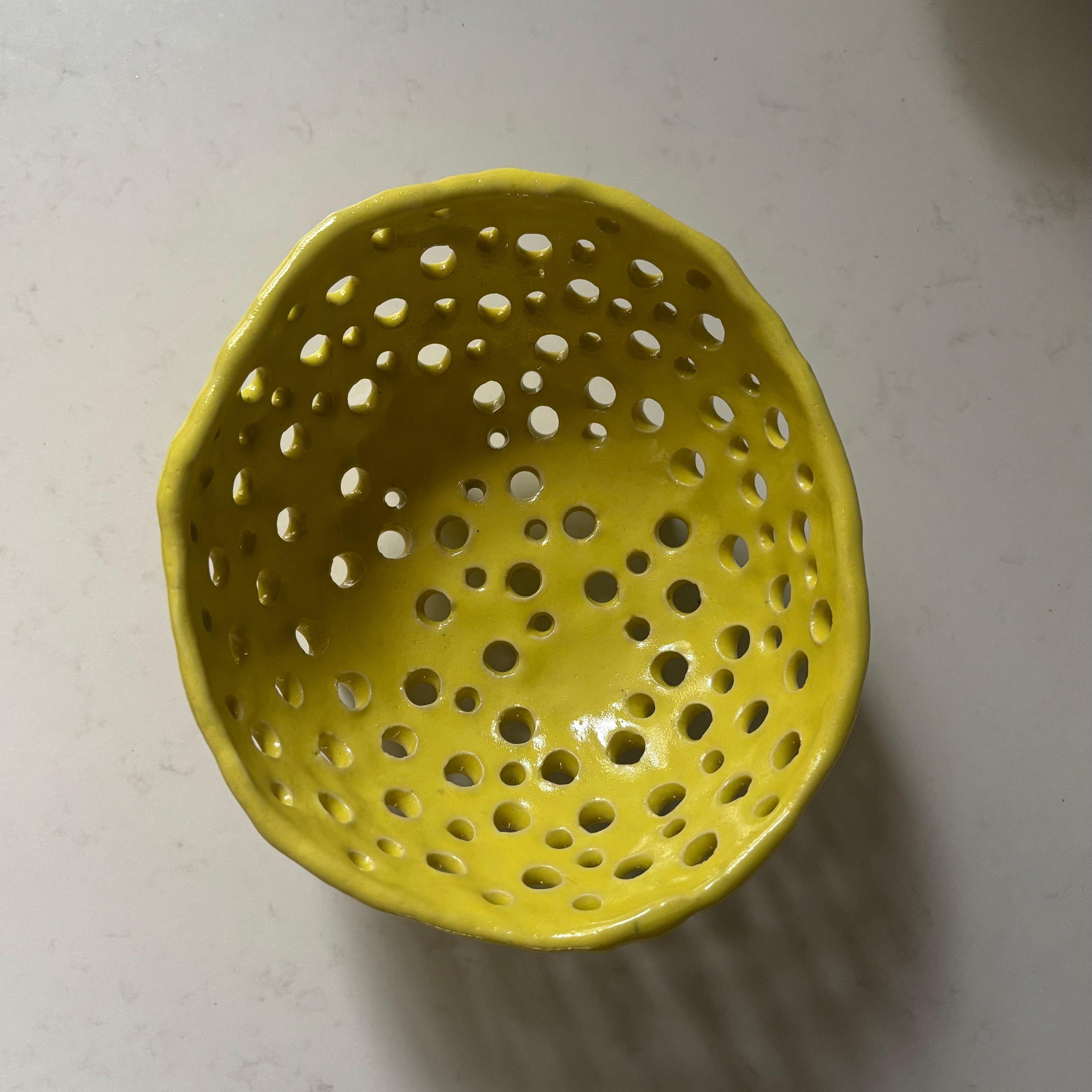 A. Mills Clay Colanders